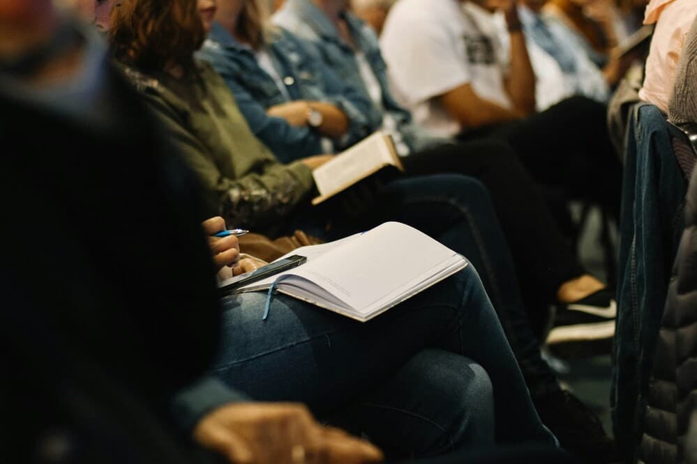 The congregation studying the Bible